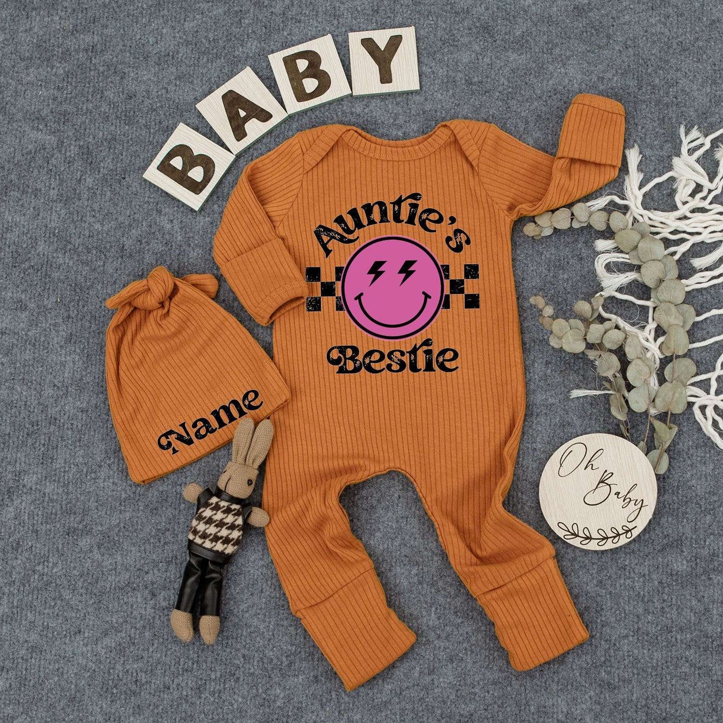 Auntie's Bestie Custom Newborn Girl Bodysuit & Hat Set with Pink Smiley Face Lightning Eyes Checkered Retro Cute Playful Baby Shower Gift Outfit