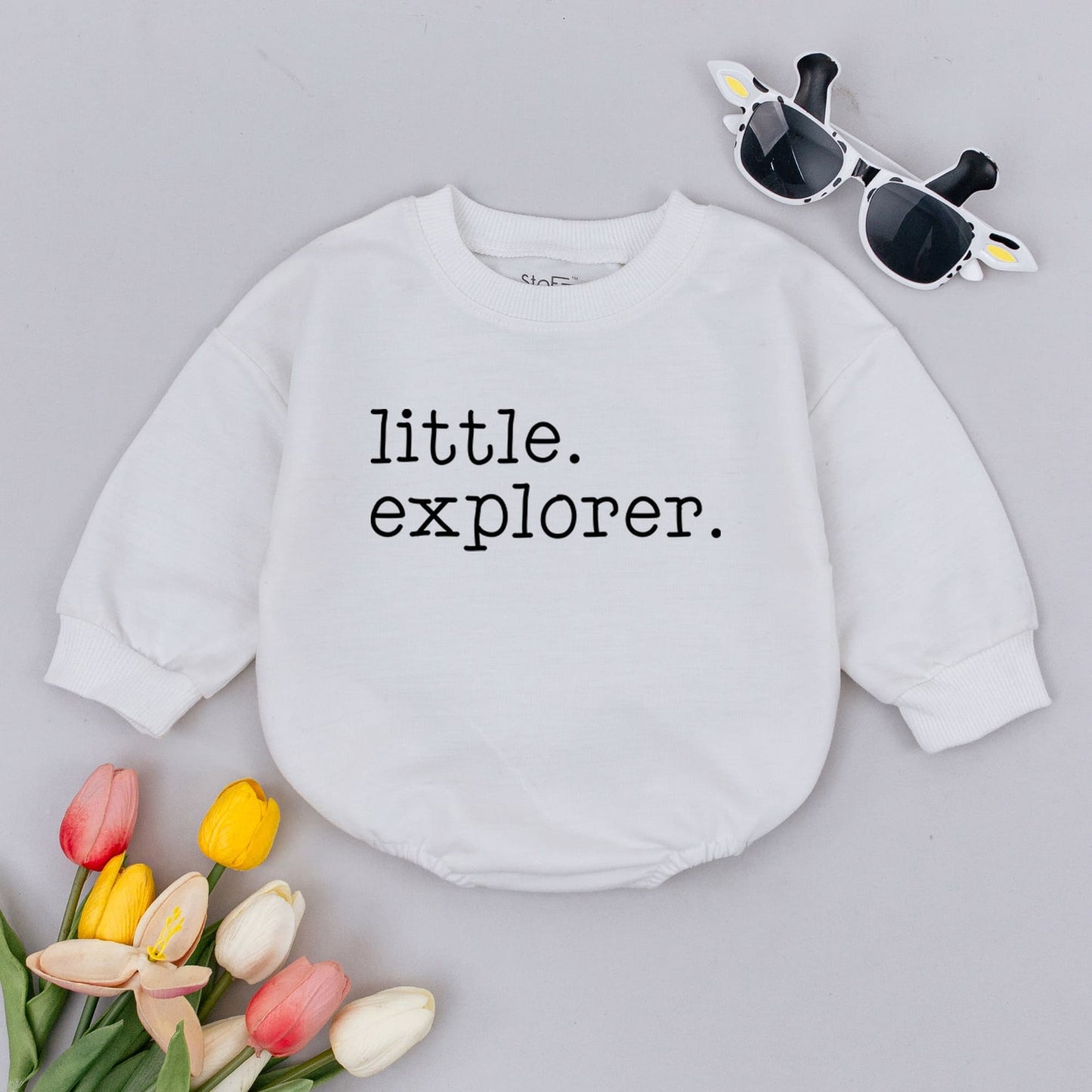 Little Explorer Baby Romper Gender Neutral Adventure Outfit with Minimalist White Text Design Oversized Summer Bodysuit for First Trip Journey