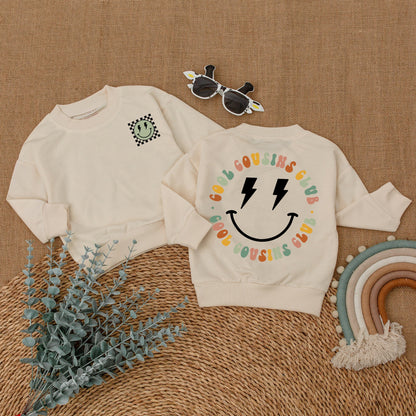 Cool Cousins Club Matching Outfits with Smiley Face Lightning Bolt Design, Fun Romper Bodysuit & T-Shirt for Kids Family Reunion