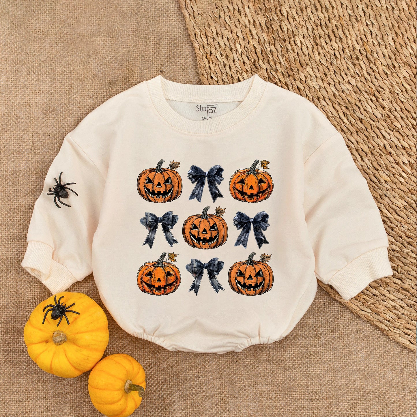 Adorable Retro Halloween Baby Romper featuring smiling jack-o'-lanterns and bows with autumn leaves a sweet first fall celebration outfit