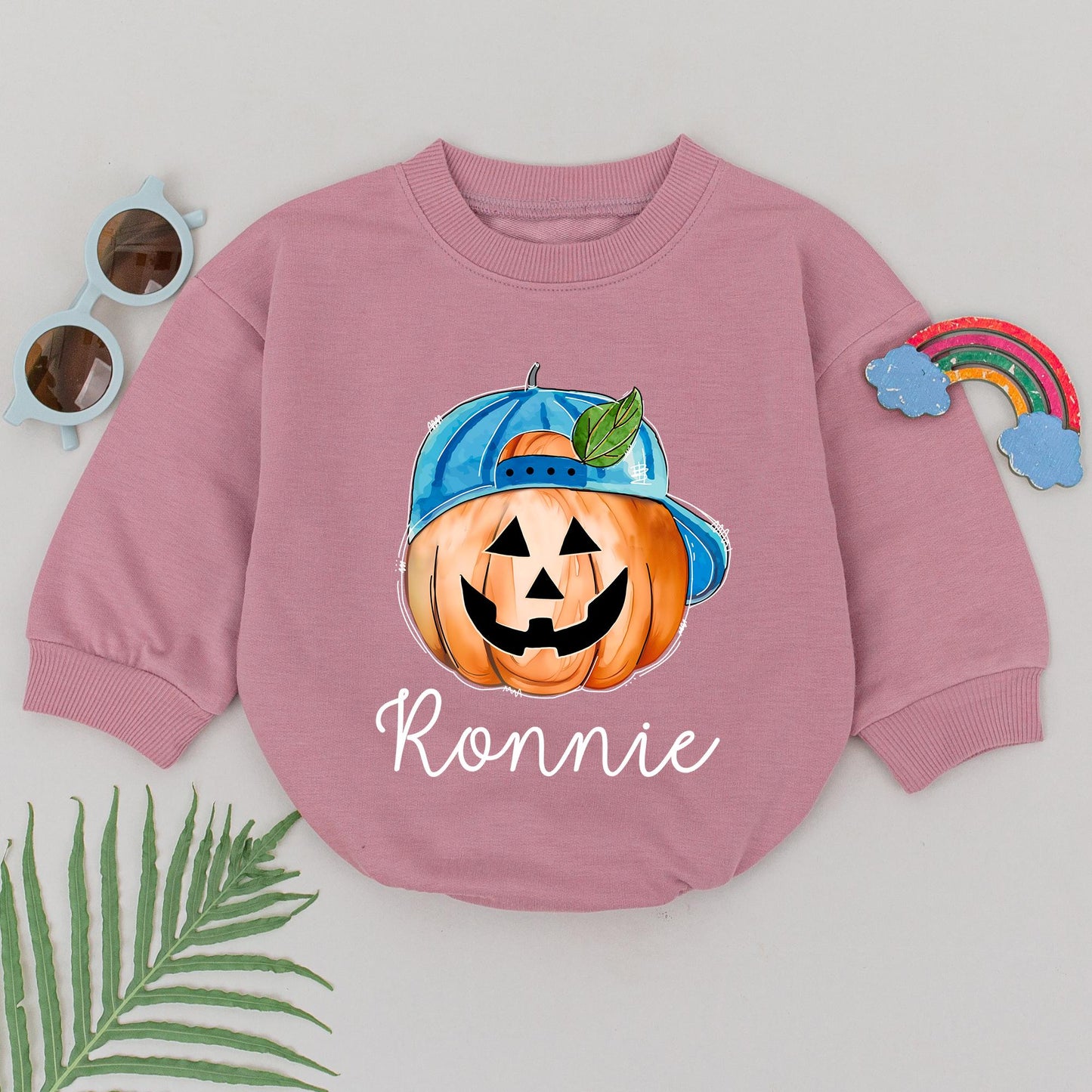 Personalized Ronnie's First Halloween Romper, Cute Pumpkin Baby Outfit with Blue Cap, Spooky Season Bodysuit, Baby Shower Gift, Newborn Boy Clothes (139 chars)