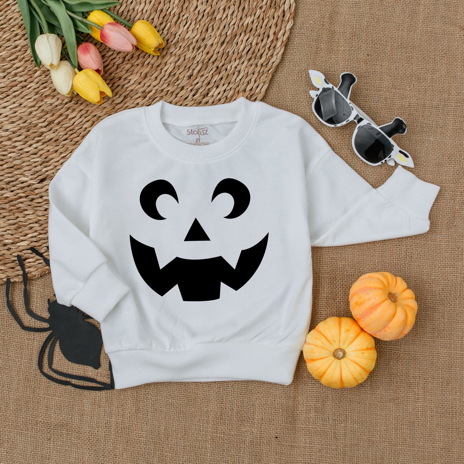 Minimalist Jack-O'-Lantern Toddler Shirt, Playful Pumpkin Face Halloween Outfit, Thanksgiving Sweatshirt, Comfy Fall Kid Clothes, Autumn Baby Tee 138 chars