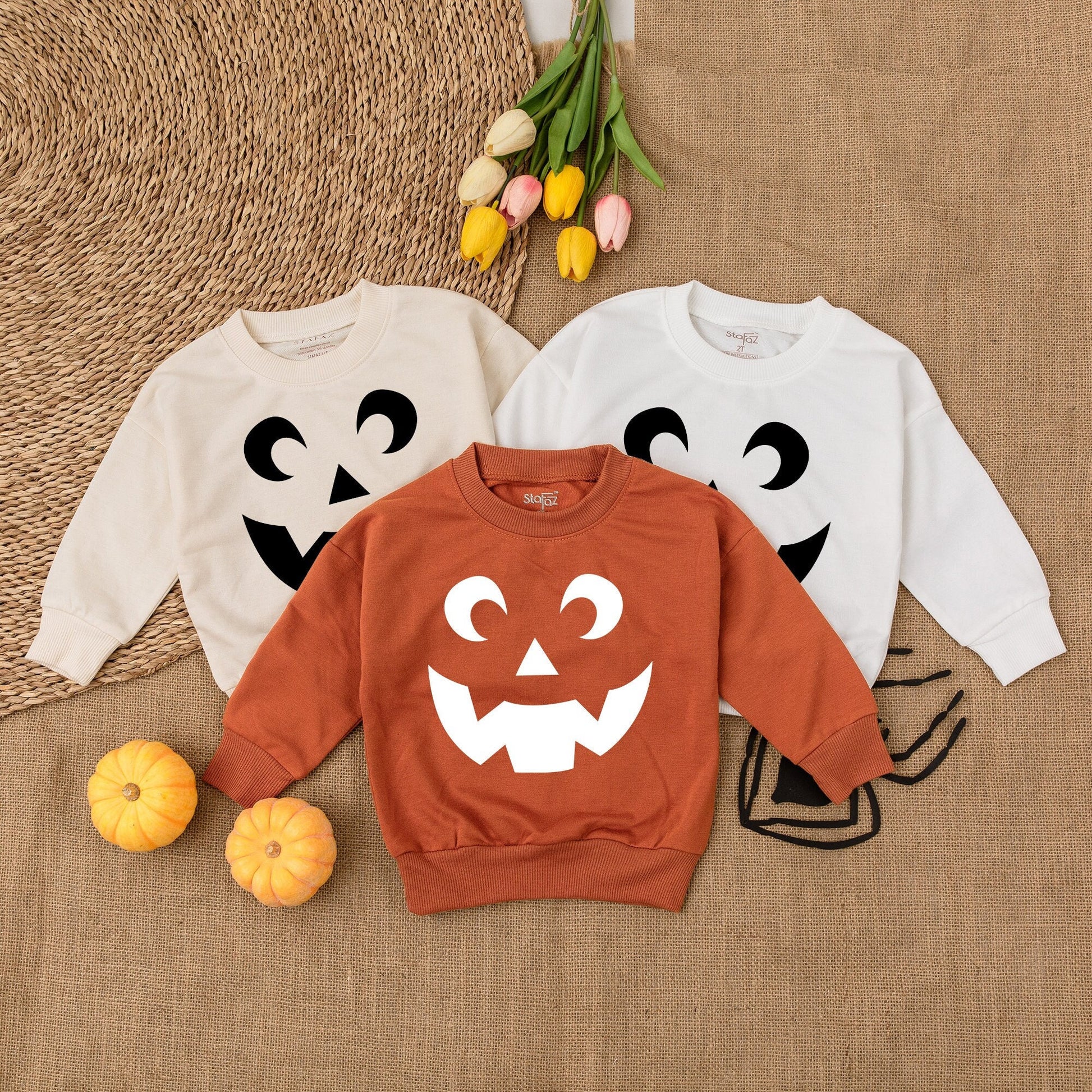 Minimalist Jack-O'-Lantern Toddler Shirt, Playful Pumpkin Face Halloween Outfit, Thanksgiving Sweatshirt, Comfy Fall Kid Clothes, Autumn Baby Tee 138 chars