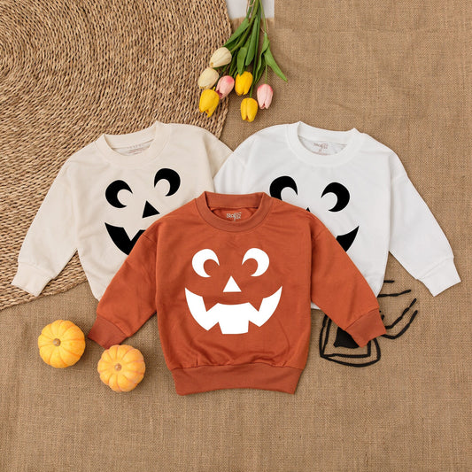 Minimalist Jack-O'-Lantern Toddler Shirt, Playful Pumpkin Face Halloween Outfit, Thanksgiving Sweatshirt, Comfy Fall Kid Clothes, Autumn Baby Tee 138 chars