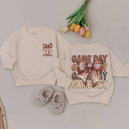 Personalized Baby Girl Game Day Football Outfit Retro Bow Bubble Romper Vintage Animal Print Jenna Name Brown Hue Sweatshirt