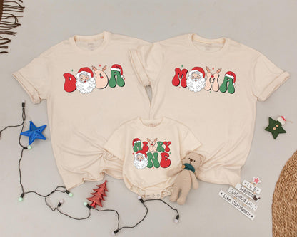 Merry One First Birthday Christmas Shirt with Santa Retro Psychedelic Lettering Matching Family Vintage Holiday Tee for Baby Announcement Gift