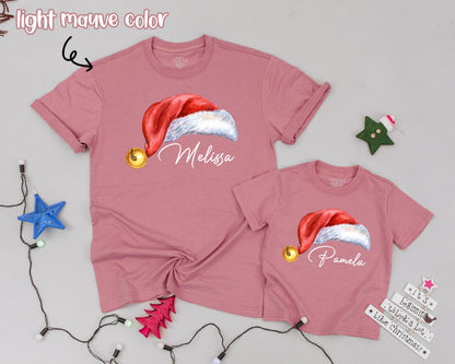 Matching Family Christmas Shirts with Personalized Name Santa Hat Design Red White Gold Jingle Bell Holiday Tee for Mom Dad Kids Baby