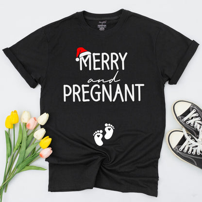Merry and Pregnant Christmas Maternity Shirt with Santa Hat Design Expecting Mom Gift perfect for a festive pregnancy reveal sweatshirt and comfy holiday sweater.