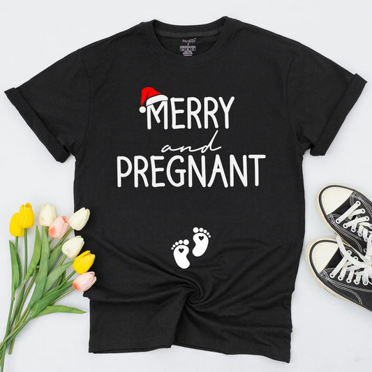 Merry and Pregnant Christmas Maternity Shirt with Santa Hat Design Expecting Mom Gift perfect for a festive pregnancy reveal sweatshirt and comfy holiday sweater.
