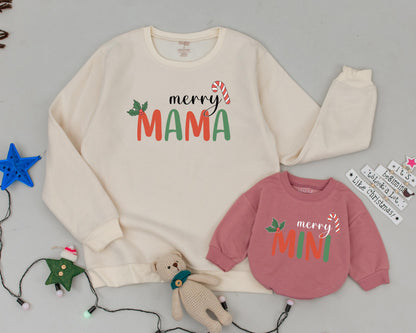 Personalized Mama and Mini Christmas Sweatshirts with festive Merry Mama Mini candy cane and holly designs for holiday family comfort