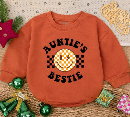 Auntie's Bestie Romper: Retro Checkerboard Smiley Face Newborn Outfit, Fun Baby Clothes Gift from Aunt, Pregnancy Announcement, Cute Auntie Baby Shirt (139 chars)