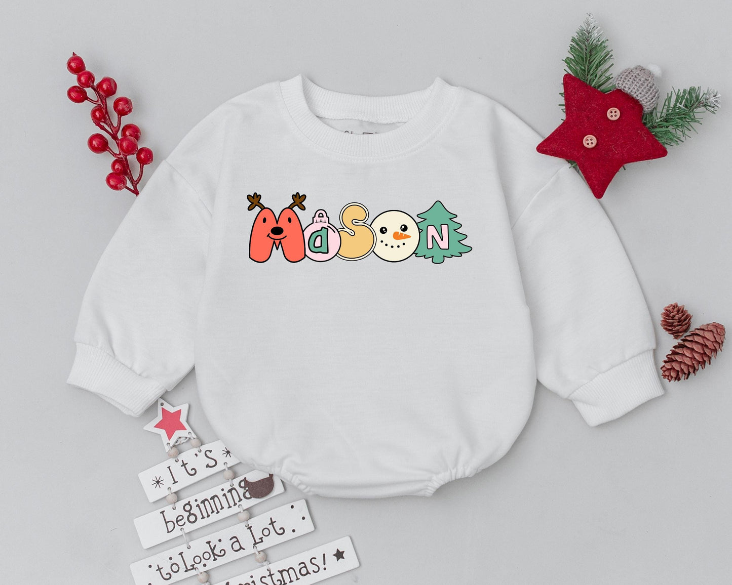 Custom Name Christmas Baby Bubble Romper spelled by Playful Pastel Holiday Icons Whimsical Tree Reindeer Ornament Outfit