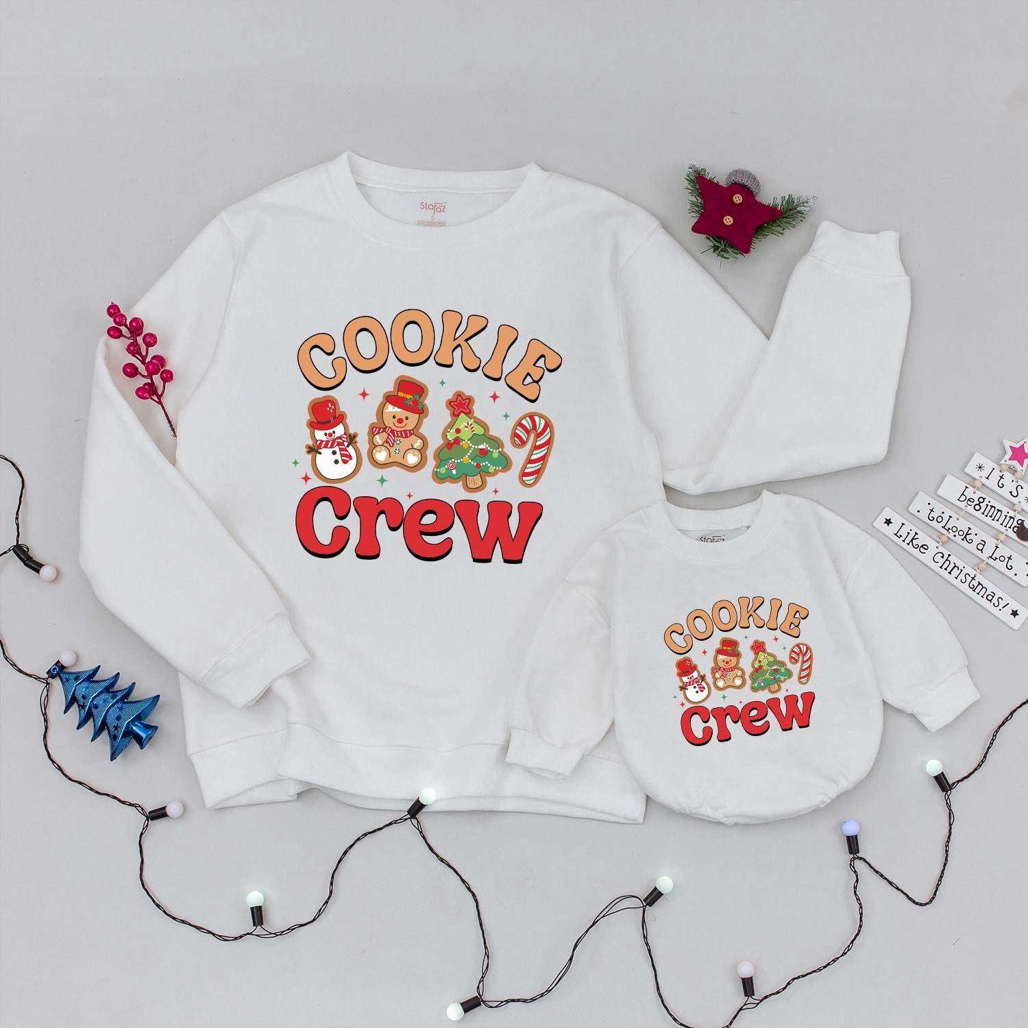 Cheerful Cookie Crew Christmas Sweatshirt perfect for Family Baking Fun featuring Snowman Gingerbread Tree Candy Cane Graphics a cozy Holiday Gift for Baby & Kids