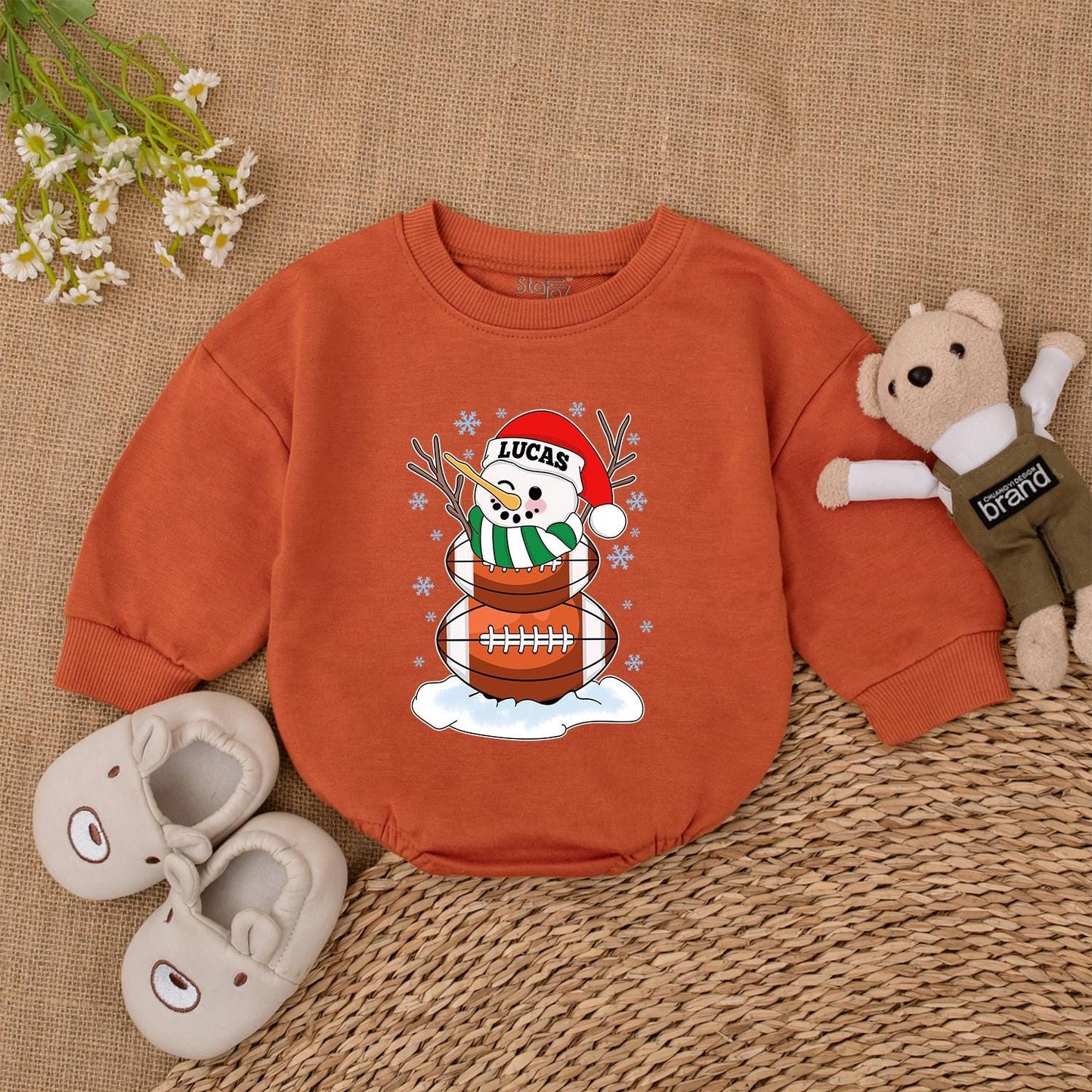 Personalized Lucas Football Snowman Christmas Baby Bodysuit with Blue Snowflakes, Festive Winter Outfit and Santa Hat Newborn Gift for Football Lovers