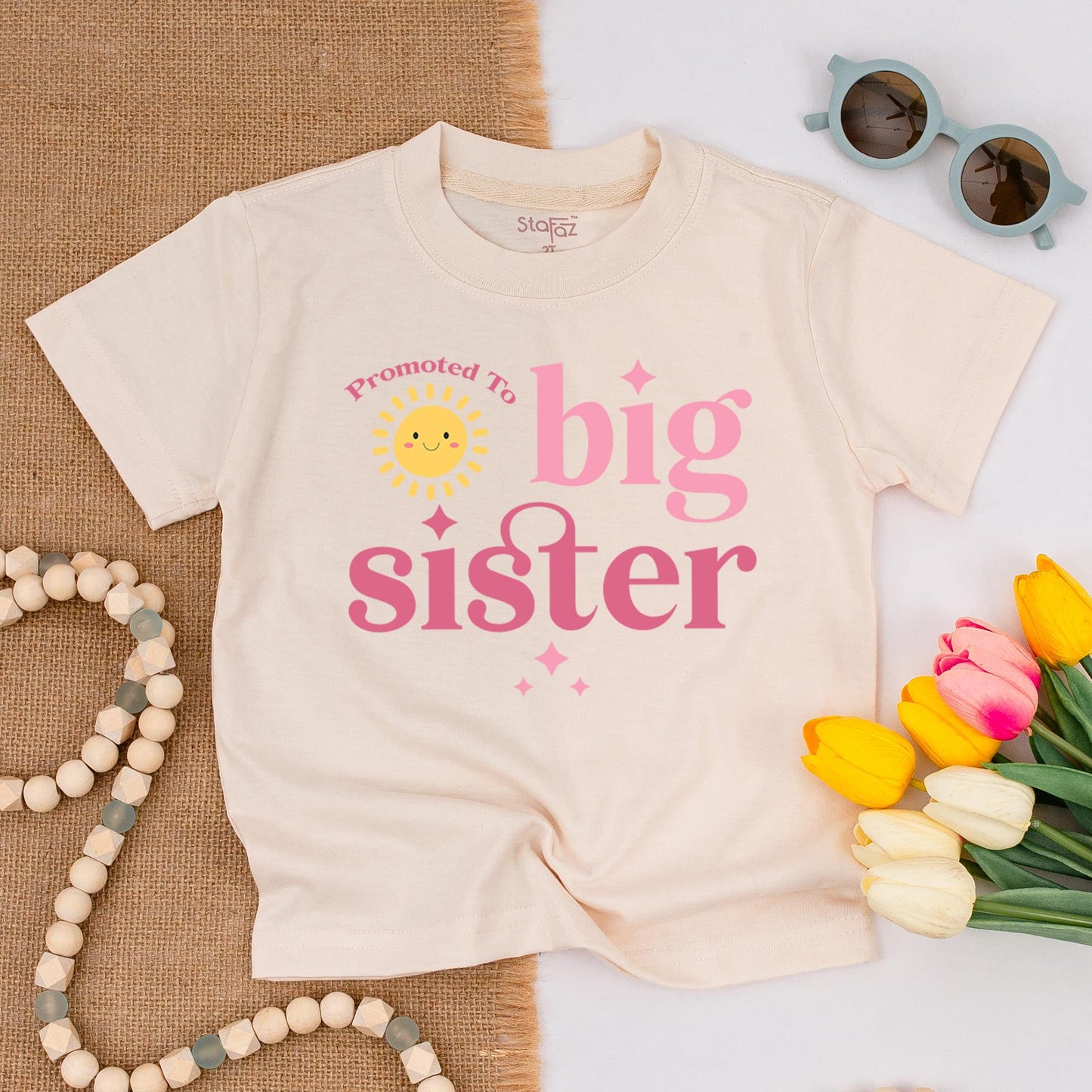Promoted To Big Sister Toddler T-Shirt Smiling Sun Graphic White Letters Starbursts Cute Announcement Baby Gift