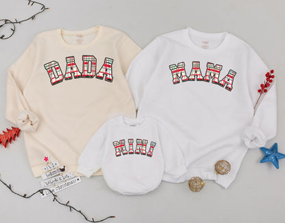 Matching Mama Dada Mini Christmas Plaid Family Sweatshirt Set featuring festive red green tartan lettering for new Mom Dad and Baby's cute holiday outfits.