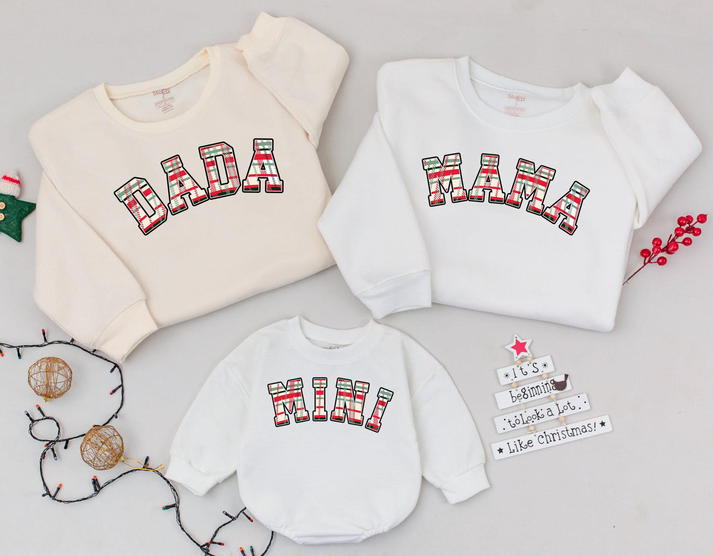 Matching Mama Dada Mini Christmas Plaid Family Sweatshirt Set featuring festive red green tartan lettering for new Mom Dad and Baby's cute holiday outfits.