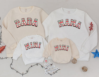 Matching Mama Dada Mini Christmas Plaid Family Sweatshirt Set featuring festive red green tartan lettering for new Mom Dad and Baby's cute holiday outfits.