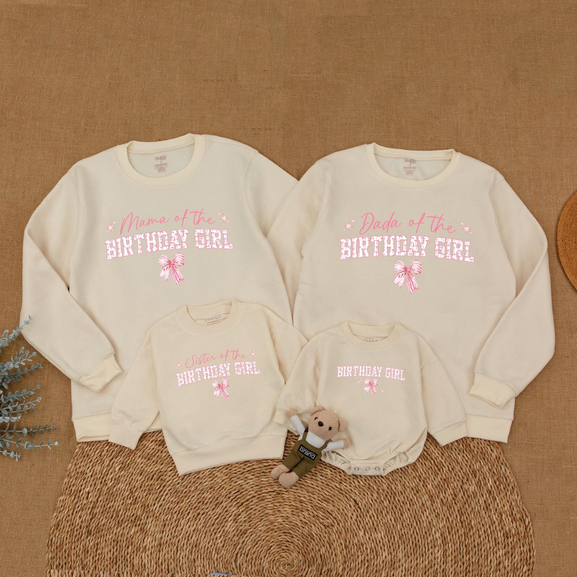 Playful Pink Bow First Birthday Family Matching Outfit Mama Dada Sister Sweatshirt Girl Celebration Sweet Pink Tone Starburst Design