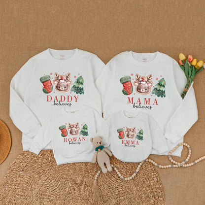 Personalized Family Christmas Believes Sweatshirts Rompers & Shirts with Cute Reindeer Tree Stocking Hand-Drawn Whimsical Design for Holiday Gatherings