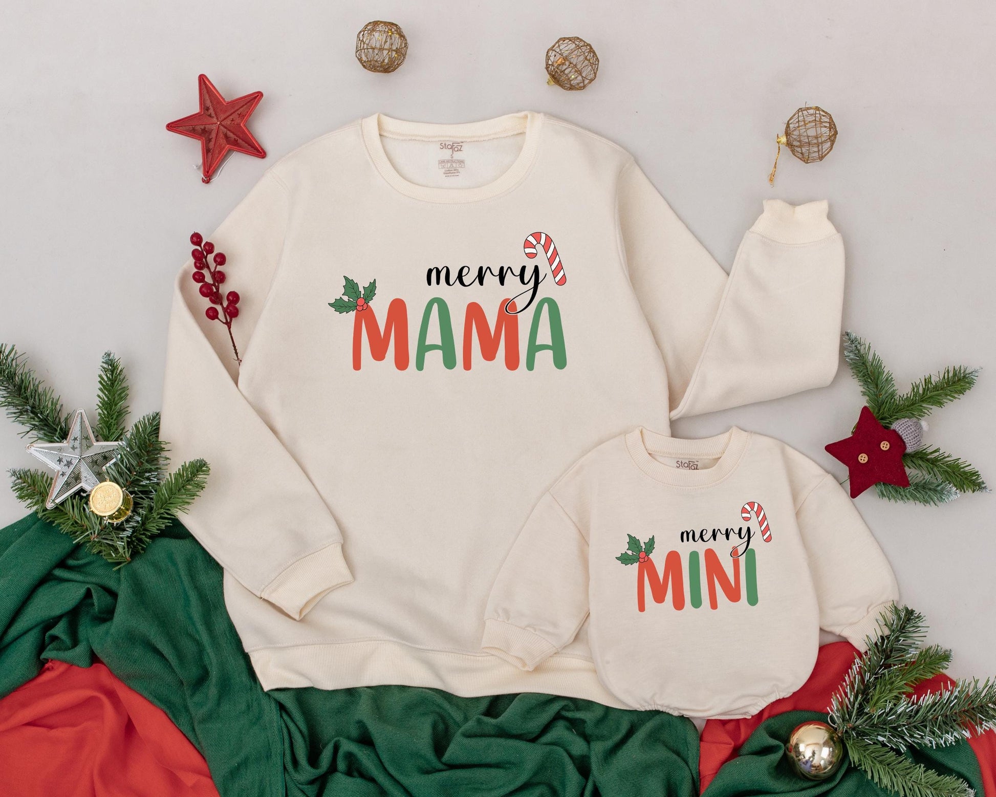 Personalized Mama and Mini Christmas Sweatshirts with festive Merry Mama Mini candy cane and holly designs for holiday family comfort