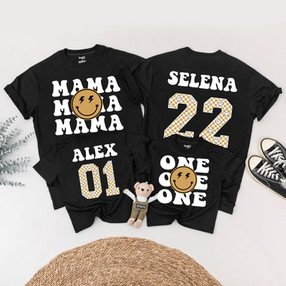Matching One Happy Dude 1st Birthday Family Shirt Set: Retro Smiley Face Design with Black Fonts, Gold Checkerboard Numbers & Lightning Bolt Eyes (138 chars)
