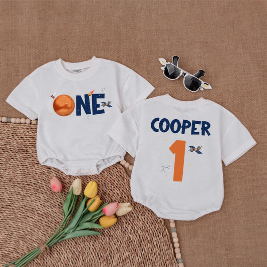 Custom One Space Baby Bubble Romper First Birthday Boy Outer Space Theme Astronaut Rocketship Planet Design Dark Blue Orange Stars