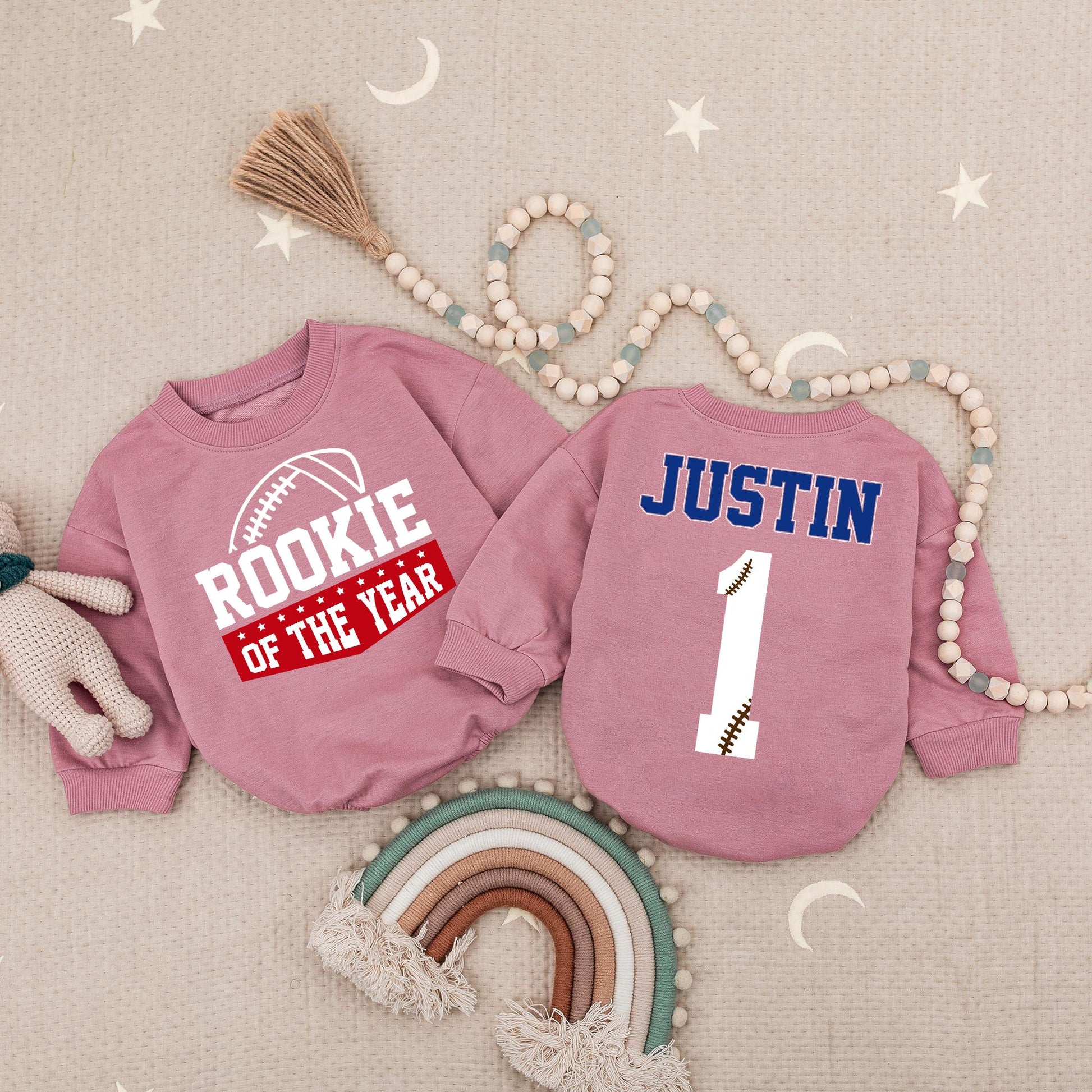 Rookie of the Year Football Baby Romper for First Birthday Celebrations Bold Blue Red Stars Playful Sports Theme Outfit