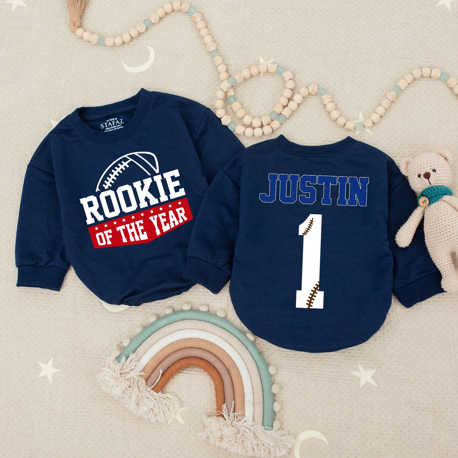 Rookie of the Year Football Baby Romper for First Birthday Celebrations Bold Blue Red Stars Playful Sports Theme Outfit
