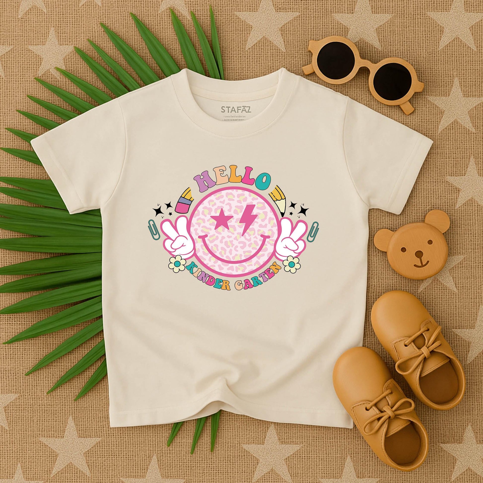 Hello Kindergarten Smiley Face Shirt a joyful back to school outfit for toddlers kids on their first day of preschool or kindergarten comfy tee