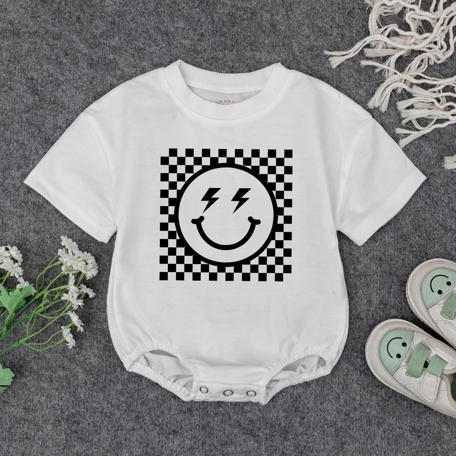 Retro Smiley Baby Romper Checkered Fun! Grandbaby Bodysuit Vintage Newborn Bubble Romper Announcement Gift Lightning Bolt Eyes Playful 1960s Style