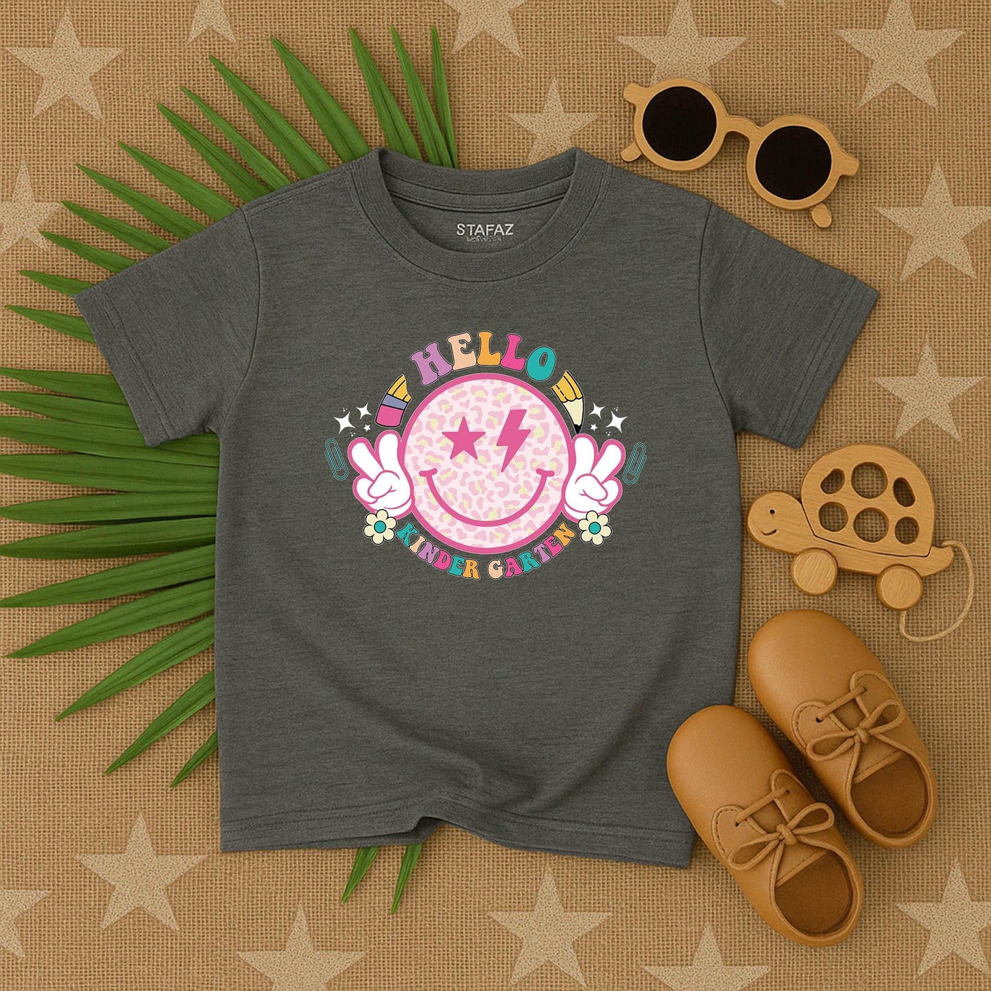 Hello Kindergarten Smiley Face Shirt a joyful back to school outfit for toddlers kids on their first day of preschool or kindergarten comfy tee
