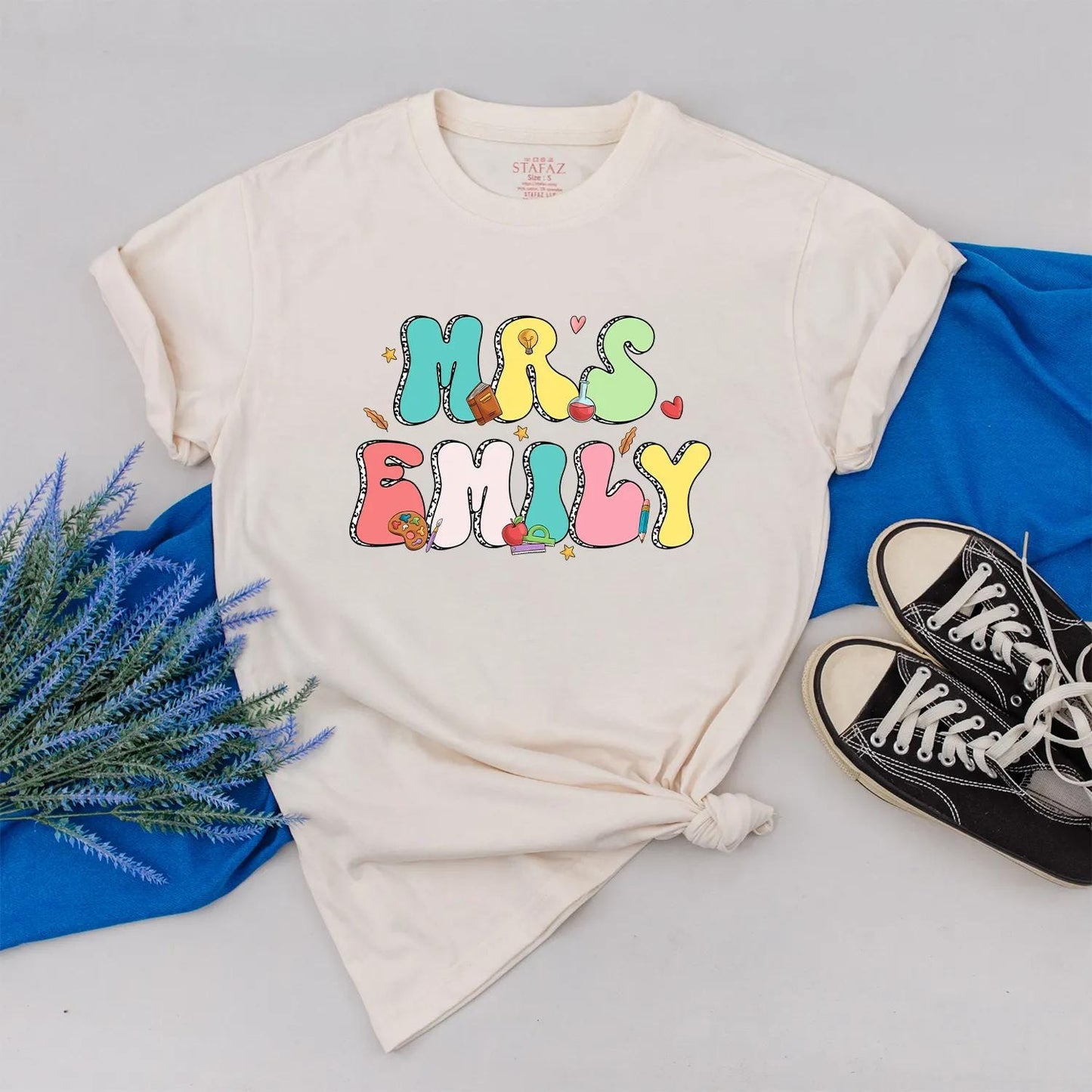 Personalized Teacher Shirt Mrs. Emily Rainbow Name Back to School Outfit, Custom Colorful Letters, Cute Heart Apple Beaker Book Pencil Graphic Gift for Women (138)
