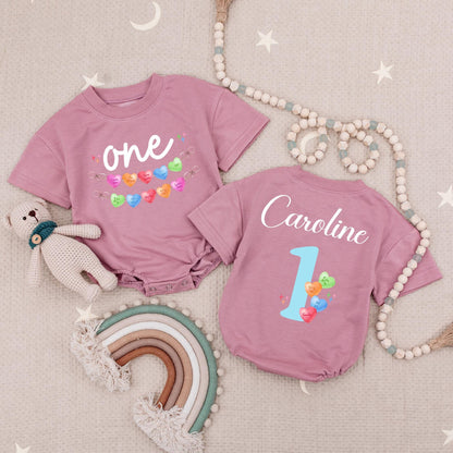 Personalized Candy Hearts First Birthday Romper for Baby Girl with Pastel Love You Be Mine Messages One Year Old Babysuit