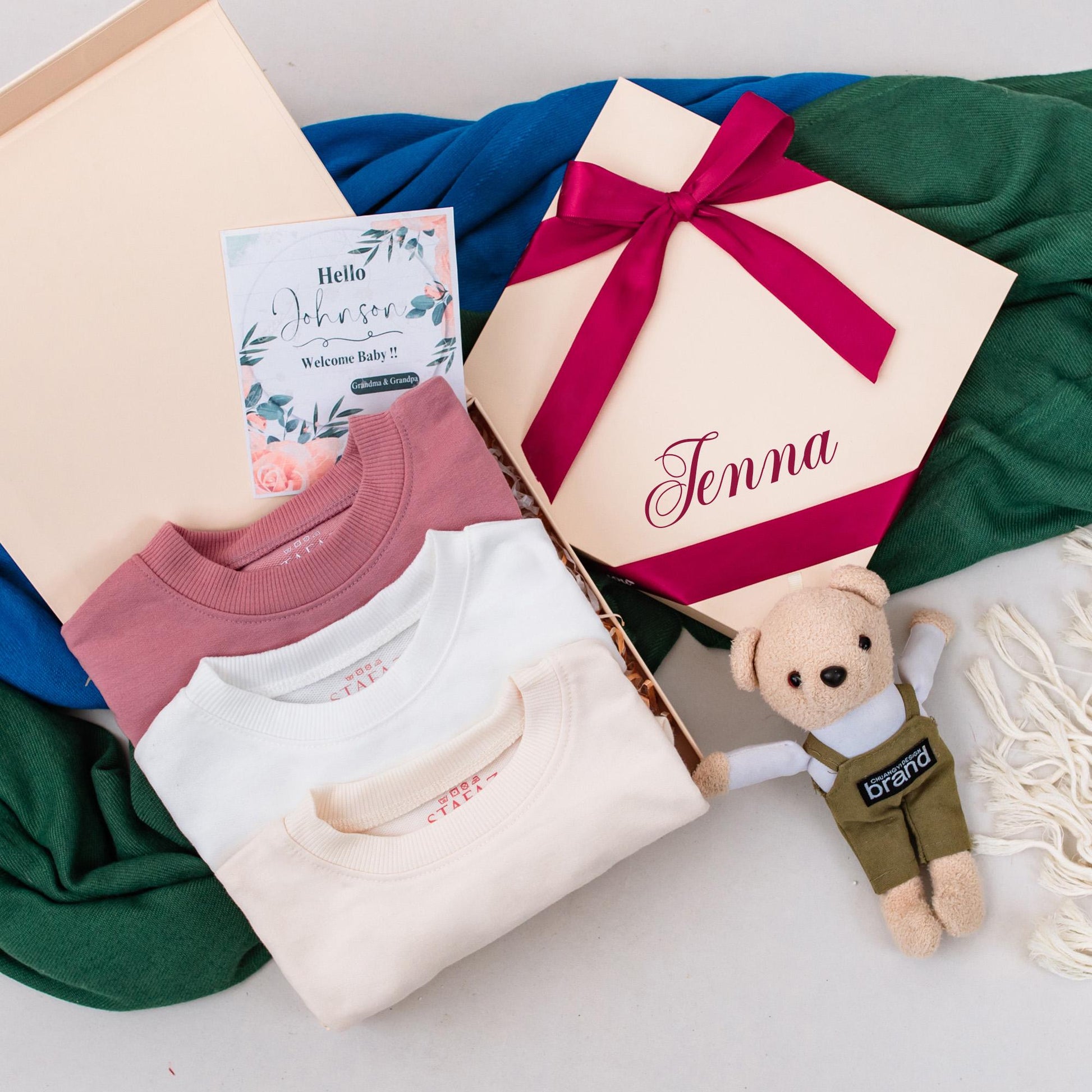 Personalized Name Baby Girl Christmas Bubble Romper featuring a cute Santa hat, zigzag 'A' and fun festive winter characters perfect for a holiday newborn gift