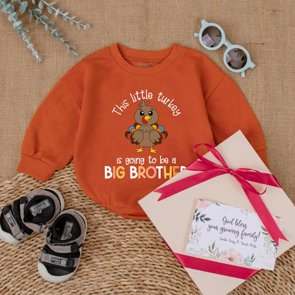 This Little Turkey Is Going To Be A Big Brother Baby Romper, a charming Thanksgiving pregnancy announcement outfit made with soft cotton for fall reveal.
