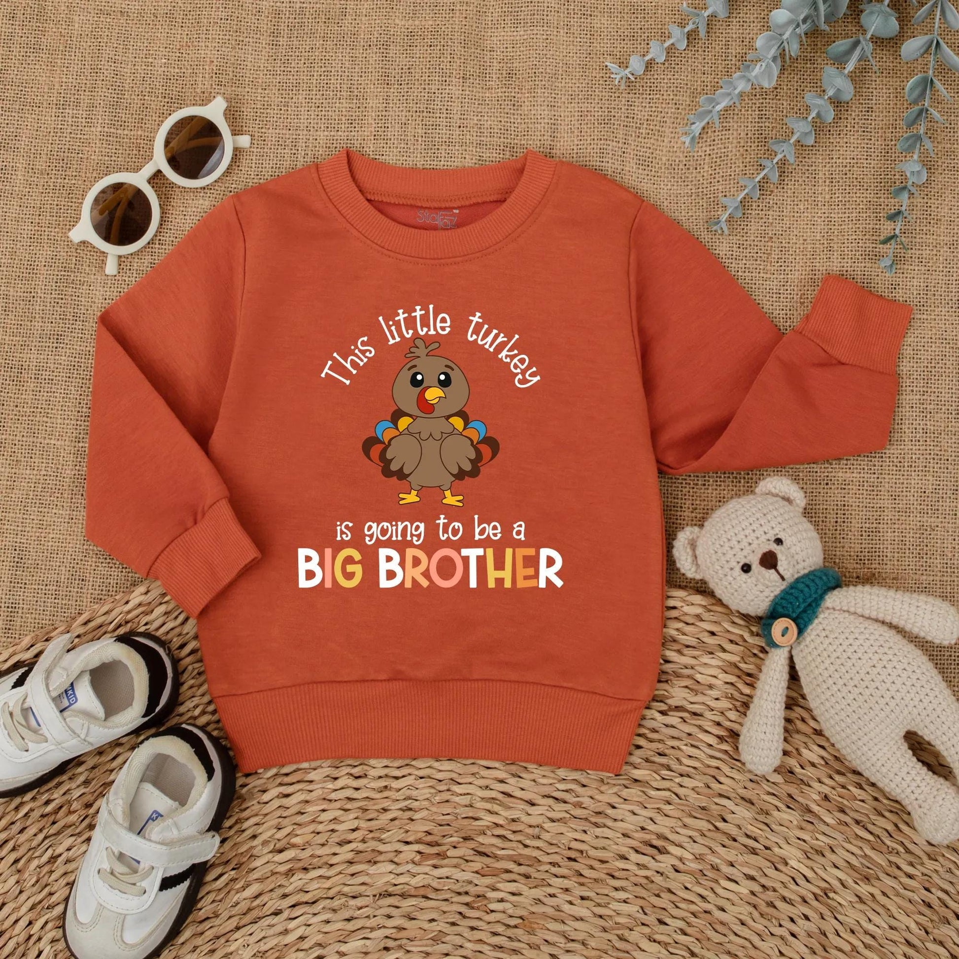 This Little Turkey Is Going To Be A Big Brother Baby Romper, a charming Thanksgiving pregnancy announcement outfit made with soft cotton for fall reveal.
