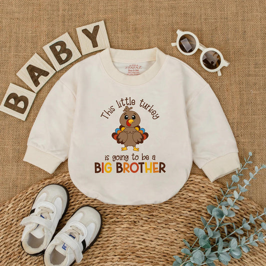 This Little Turkey Is Going To Be A Big Brother Baby Romper, a charming Thanksgiving pregnancy announcement outfit made with soft cotton for fall reveal.