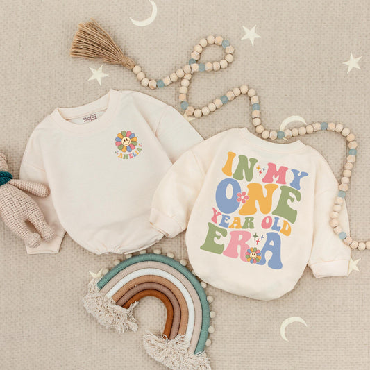 Personalized 'In My One Year Old Era' Romper with Retro Font & Flower Accent, Custom Amelia Romper, First Birthday Outfit, Cheerful Baby Romper
