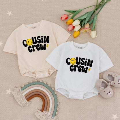 Groovy Cousin Crew Smiley Face Baby Romper Natural Babysuit for Matching Cousins perfect for family trips and playful retro moments.