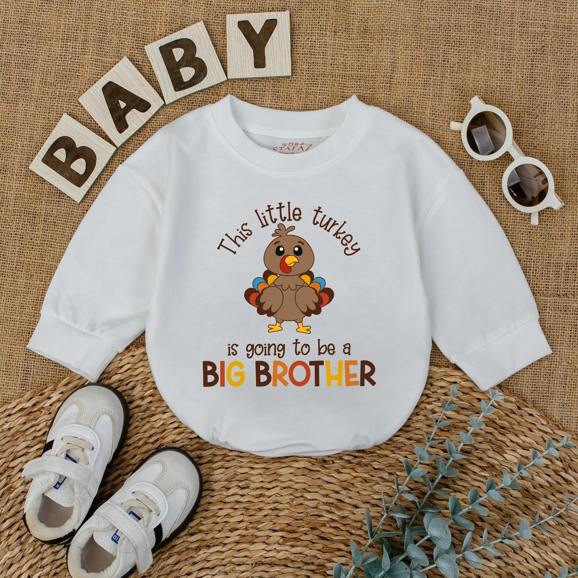 This Little Turkey Is Going To Be A Big Brother Baby Romper, a charming Thanksgiving pregnancy announcement outfit made with soft cotton for fall reveal.