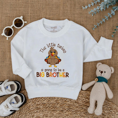 This Little Turkey Is Going To Be A Big Brother Baby Romper, a charming Thanksgiving pregnancy announcement outfit made with soft cotton for fall reveal.