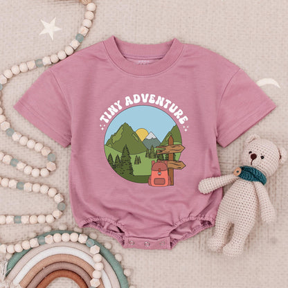Tiny Adventure Baby Romper Nature Scene with Mountains Pine Trees Sun Snow Cap & Backpack