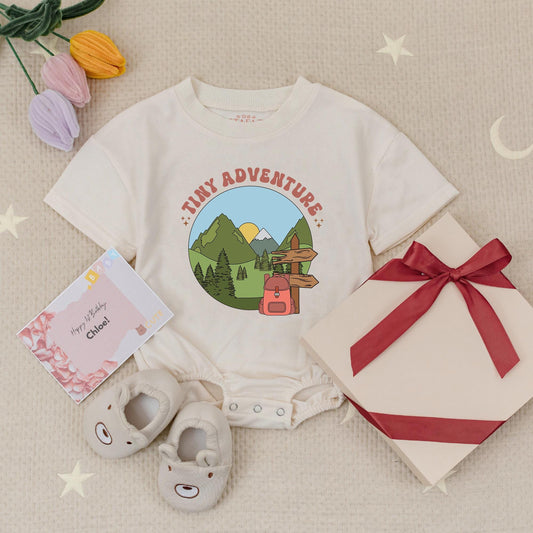 Tiny Adventure Baby Romper Nature Scene with Mountains Pine Trees Sun Snow Cap & Backpack
