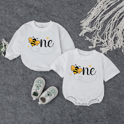 Sweet Bee First Birthday Romper, Cute One-sie with Flying Bee Design, Baby Girl Outfit, Yellow Hearts, Playful Party Clothes, Adorable Bee Day Gift (139 chars)