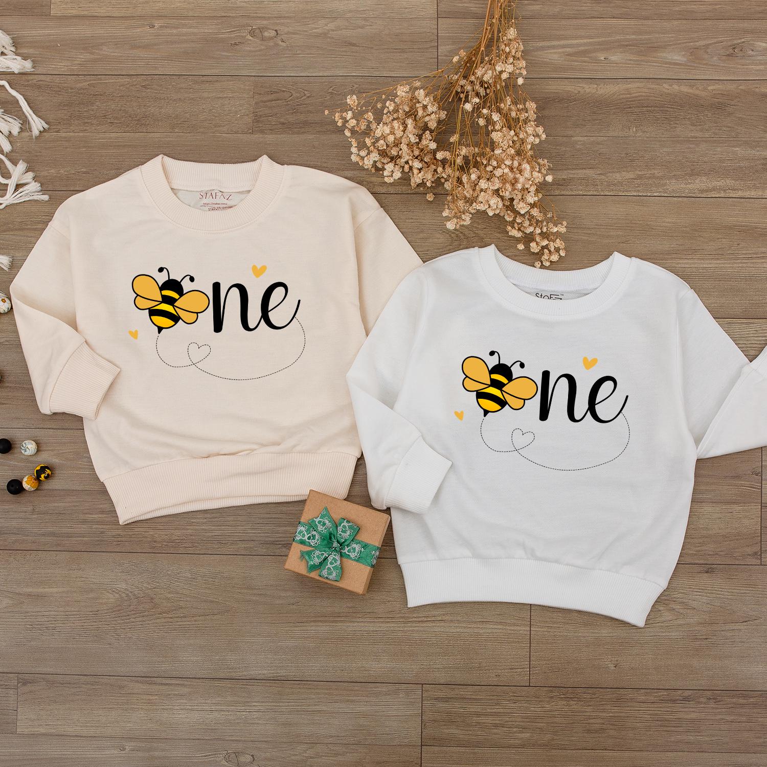 Sweet Bee First Birthday Romper, Cute One-sie with Flying Bee Design, Baby Girl Outfit, Yellow Hearts, Playful Party Clothes, Adorable Bee Day Gift (139 chars)