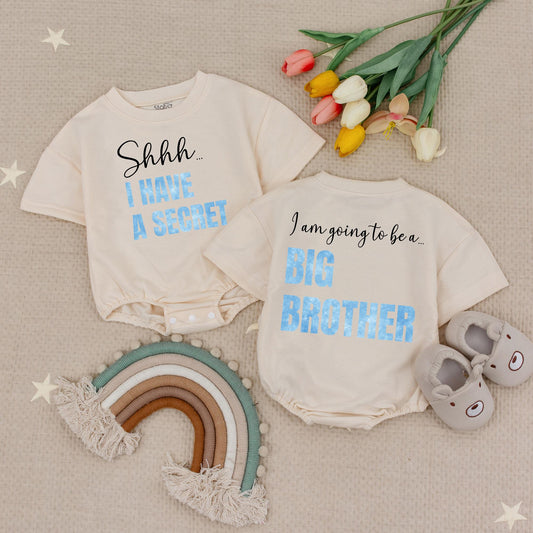 Shhh I Have A Secret Big Brother Announcement Bubble Romper Promoted To Big Brother Typography Design Black Script Light Blue Letters Modern Cute Babysuit