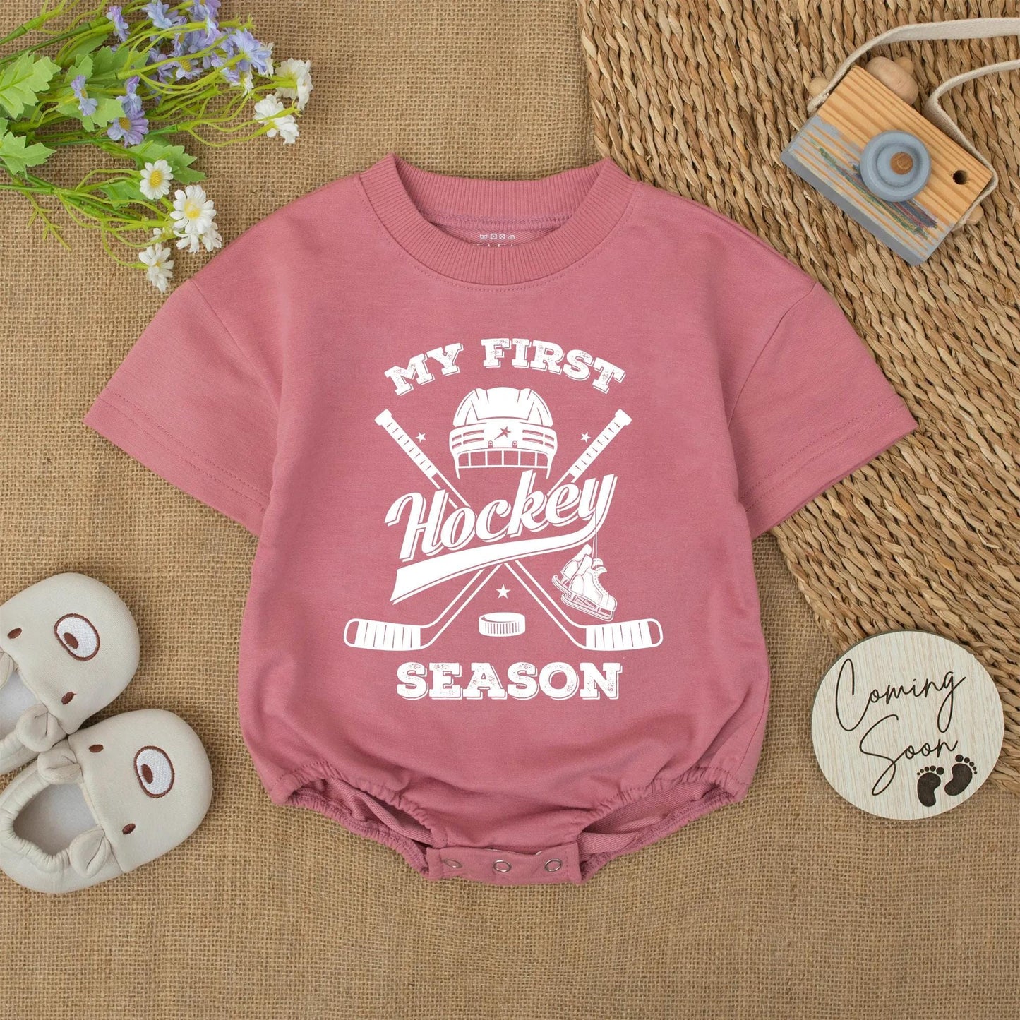 My First Hockey Season Baby Bodysuit: Vintage-Style Newborn Outfit with Helmet, Sticks & Skates Graphic, Cute Winter Romper, Unique Hockey Baby Shower Gift (137 chars)