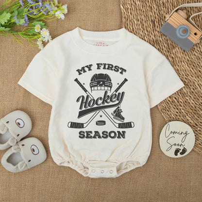My First Hockey Season Baby Bodysuit: Vintage-Style Newborn Outfit with Helmet, Sticks & Skates Graphic, Cute Winter Romper, Unique Hockey Baby Shower Gift (137 chars)