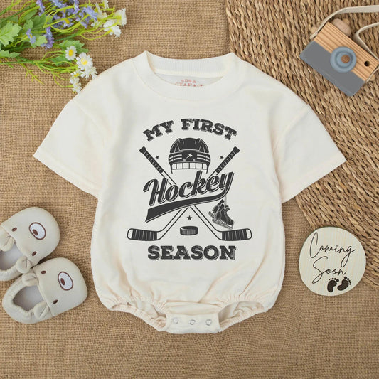My First Hockey Season Baby Bodysuit: Vintage-Style Newborn Outfit with Helmet, Sticks & Skates Graphic, Cute Winter Romper, Unique Hockey Baby Shower Gift (137 chars)
